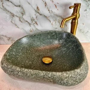 کاسه روشویی ساخته شده با سنگ طبیعی رودخانه ای